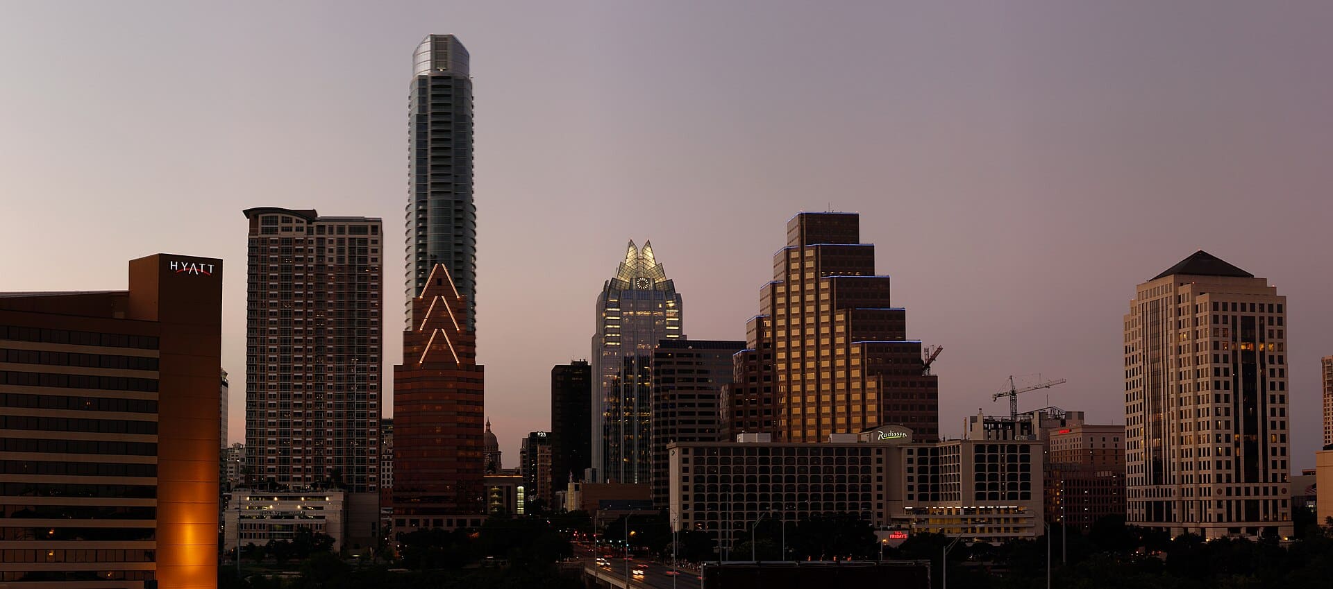 Austin Skyline at Dusk Author is User:Jcutrer on Commons.