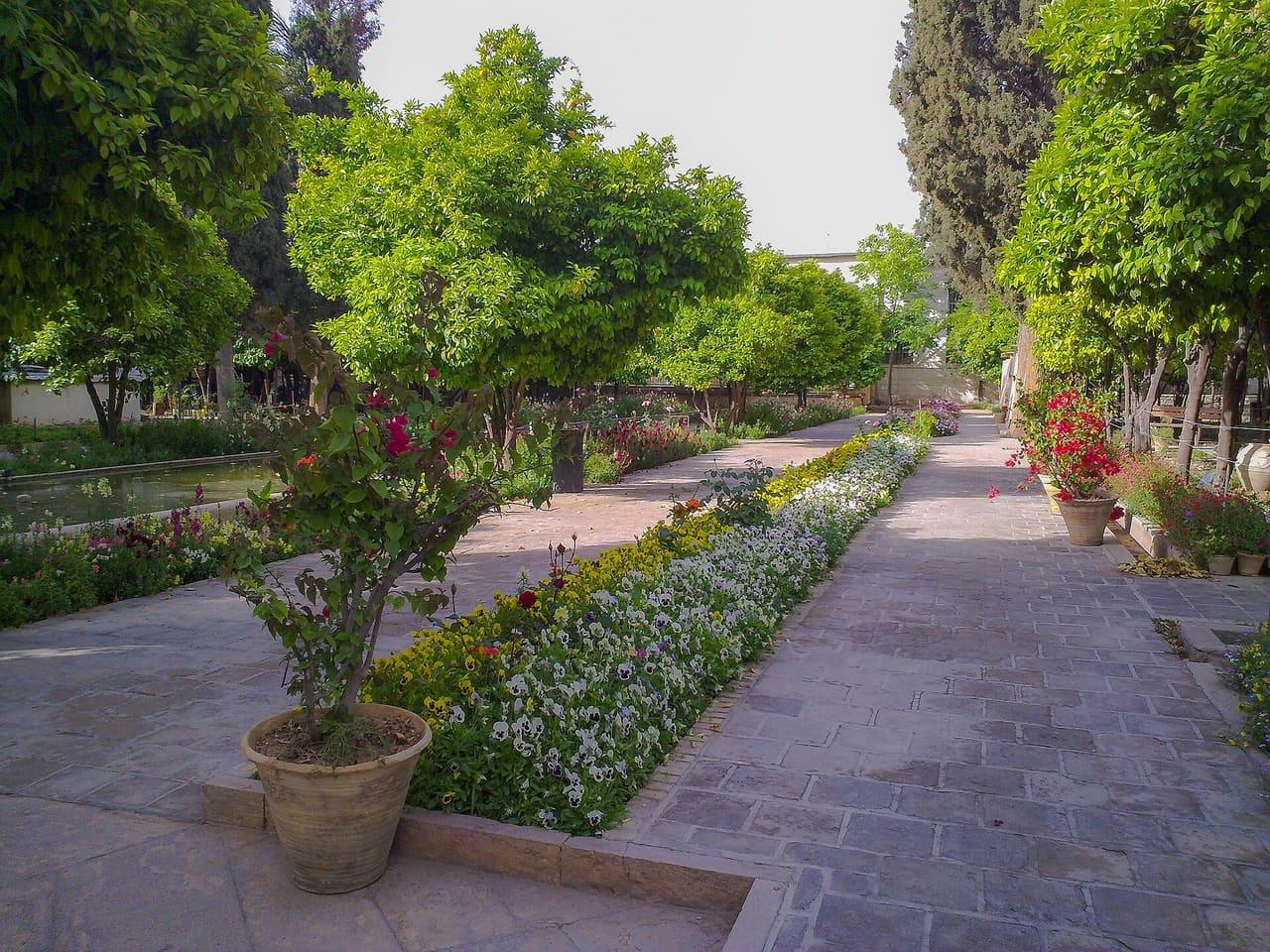 Shiraz (Listeni/ʃiːˈrɑːz/; Persian: شیراز, Šīrāz, Persian pronunciation: , About this sound pronunciation (help·info)) is the sixth-most-populous city of Iran and the capital of Fars Province (Old Persian as Pârsâ). At the 2011 census, the population of the city was 1,700,665 and its built-up area with "Shahr-e Jadid-e Sadra" (Sadra New Town) was home to 1,500,644 inhabitants. Shiraz is located in the southwest of Iran on the "Roodkhaneye Khoshk" (The Dry River) seasonal river. It has a moderate climate and has been a regional trade center for over a thousand years. Shiraz is one of the oldest cities of ancient Persia.