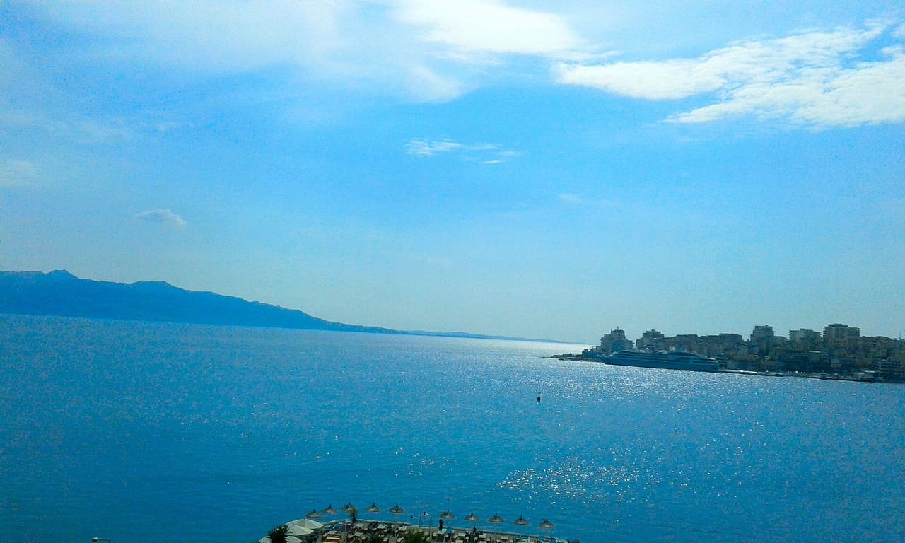 Skyline of Sarande, Albania (Corfu at left)
