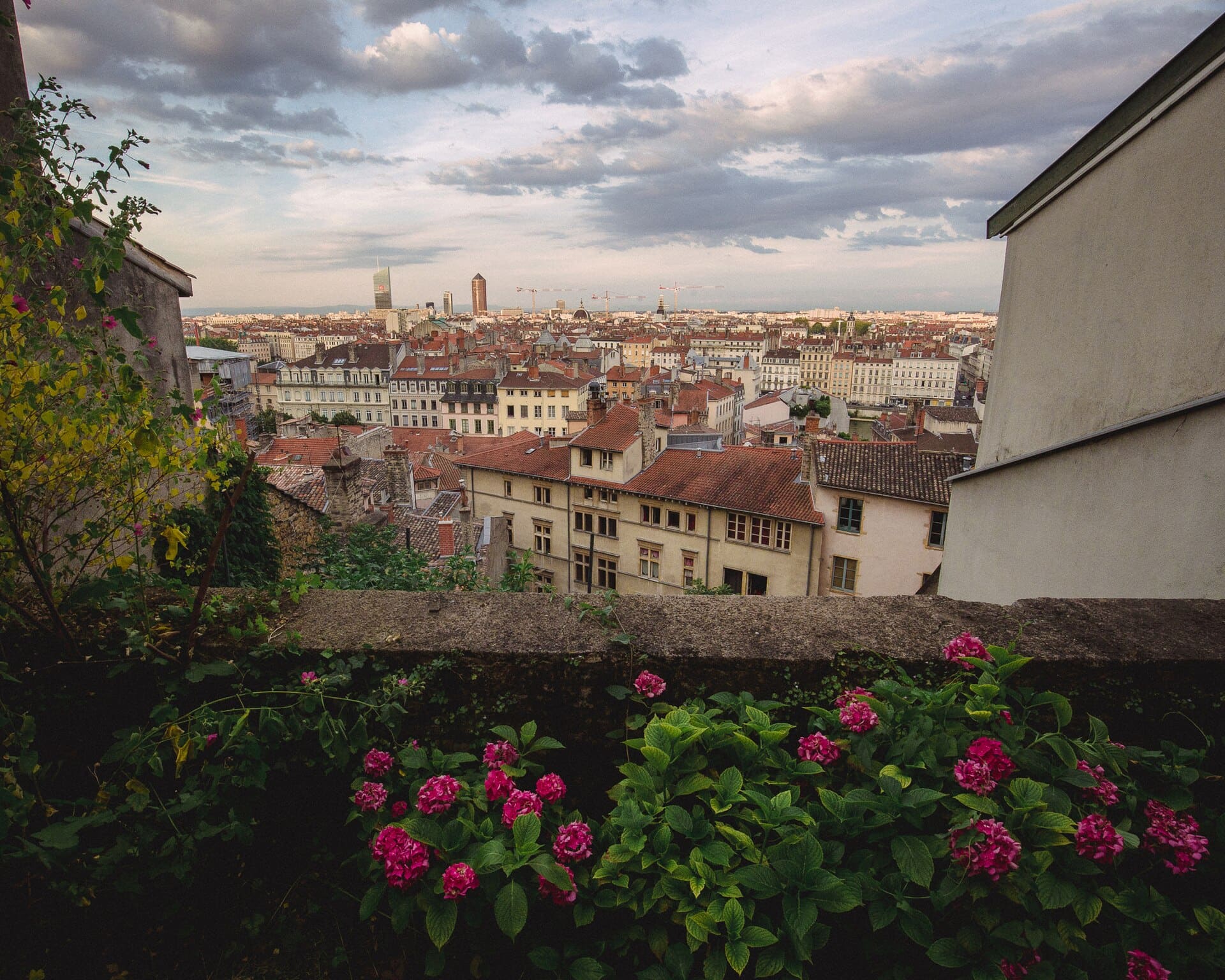 500px provided description: Looking out over Lyon, France [#flowers ,#landscape ,#city ,#buildings ,#urban ,#architecture ,#cityscape ,#france ,#skyline ,#lyon ,#vieux lyon]