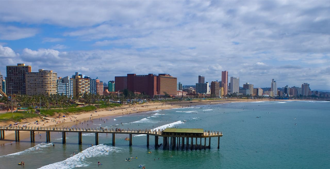Skyline of Durban, South Africa, from helicopter. Vetchies pier. The red building in the middle ist Addington Hospital, followed by the beachfront.