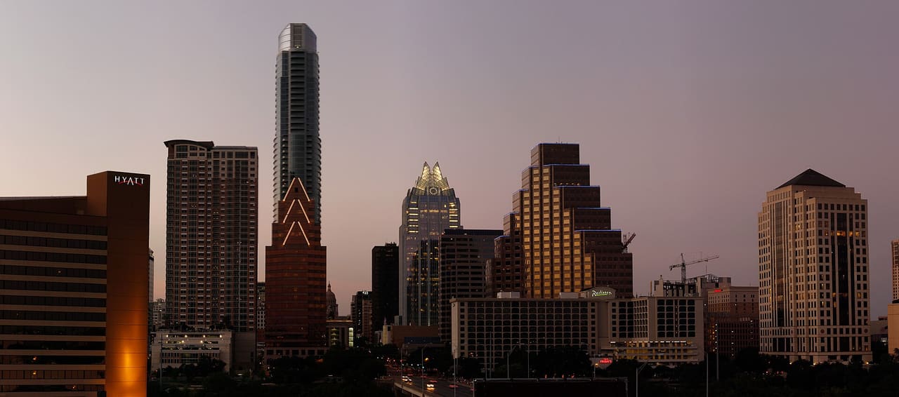 Austin Skyline at Dusk Author is User:Jcutrer on Commons.