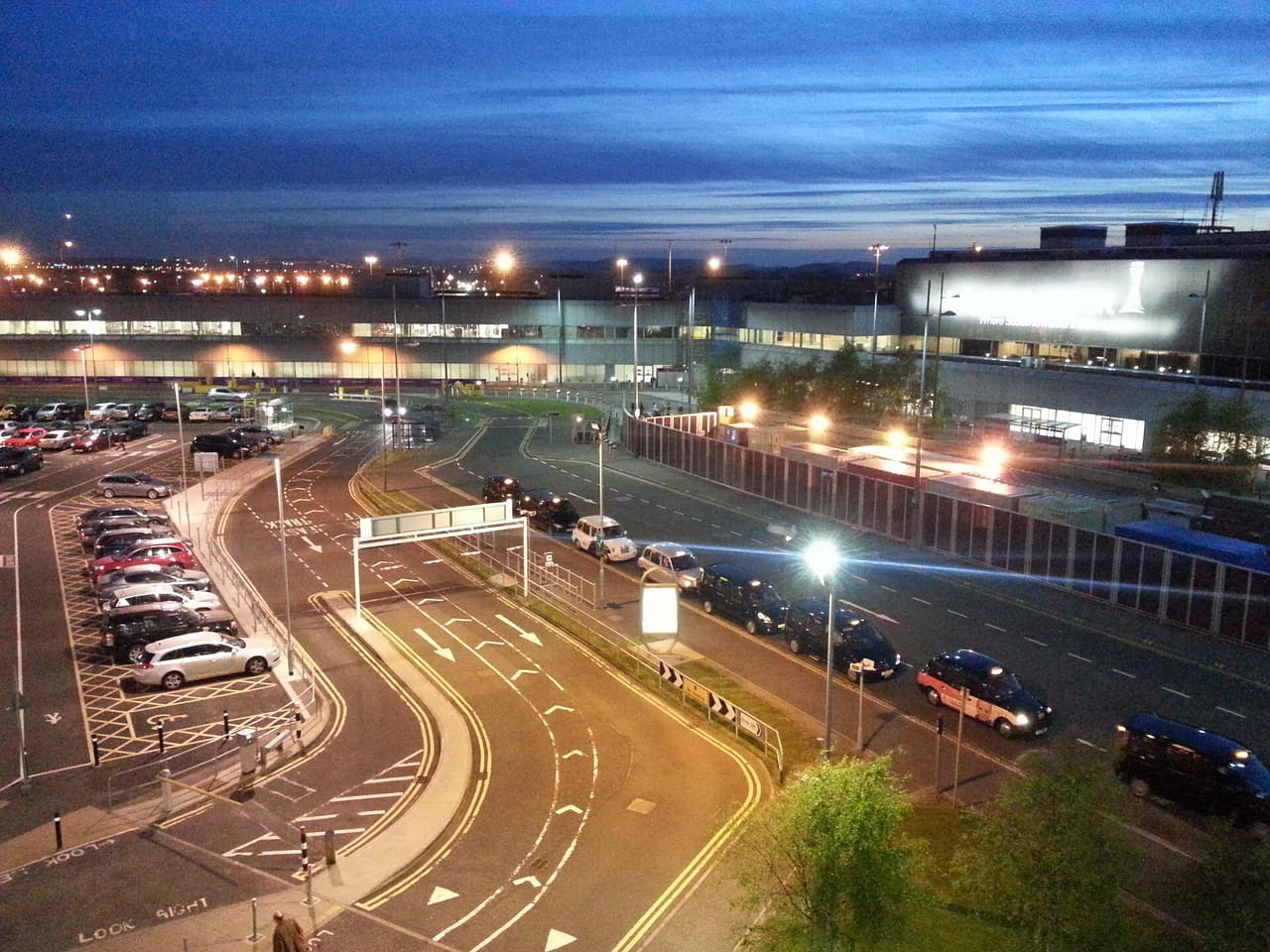 A taxi stand outside an airport terminal