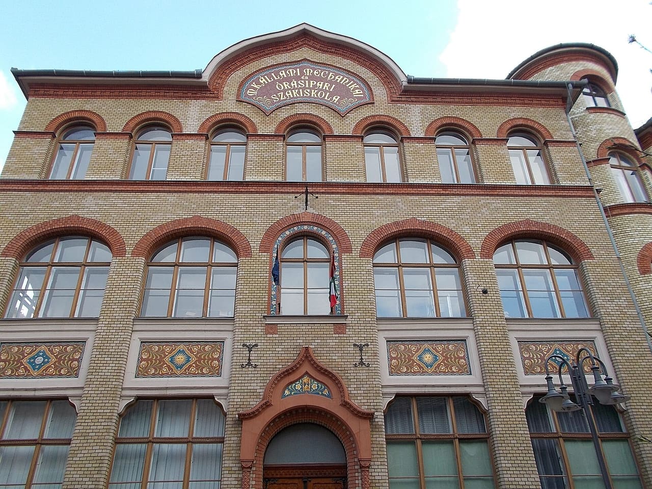 : Óbuda University, Kandó Kálmán Faculty of Electrical Engineering. Art Nouveau building was built according to the plans of architect Gyula Pártos in 1901. Former State Mechanical and Clock Industrial Vocational School. - Szűz Street, 15 Tavaszmező Street, Csarnok neighbourhood, Budapest District VIII.