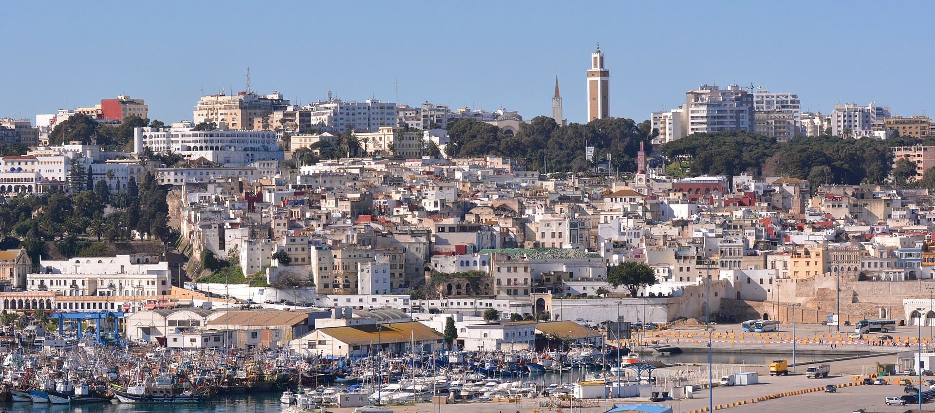 This Moroccan town sits on the south-west of the straits of Gibraltar. The view here is from an elevated position in the harbour area, looking towards the old town centre. the tall building on the skyline is a mosque. Tourism is a significant part of Morocco's economy and Tangier is a popular cruise port.